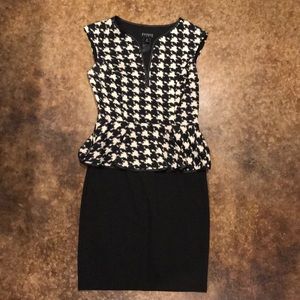 Back and cream Peplum dress.